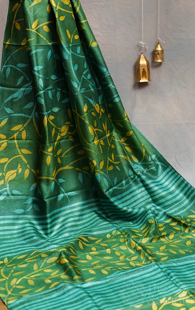 Green handwoven tussar silk saree with batik prints