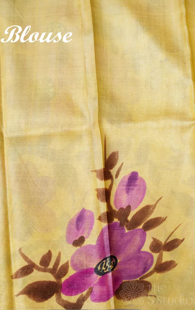 Light yellow tussar silk saree with floral batik prints and hand painting