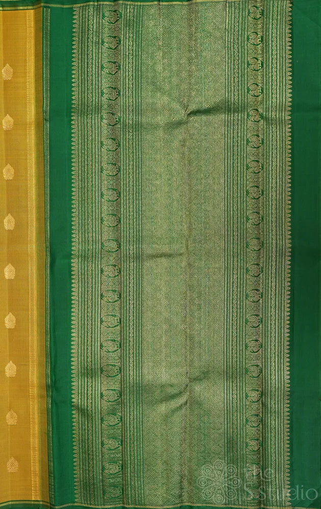 Mustard yellow kora Kanchipuram silk saree with zari buttas