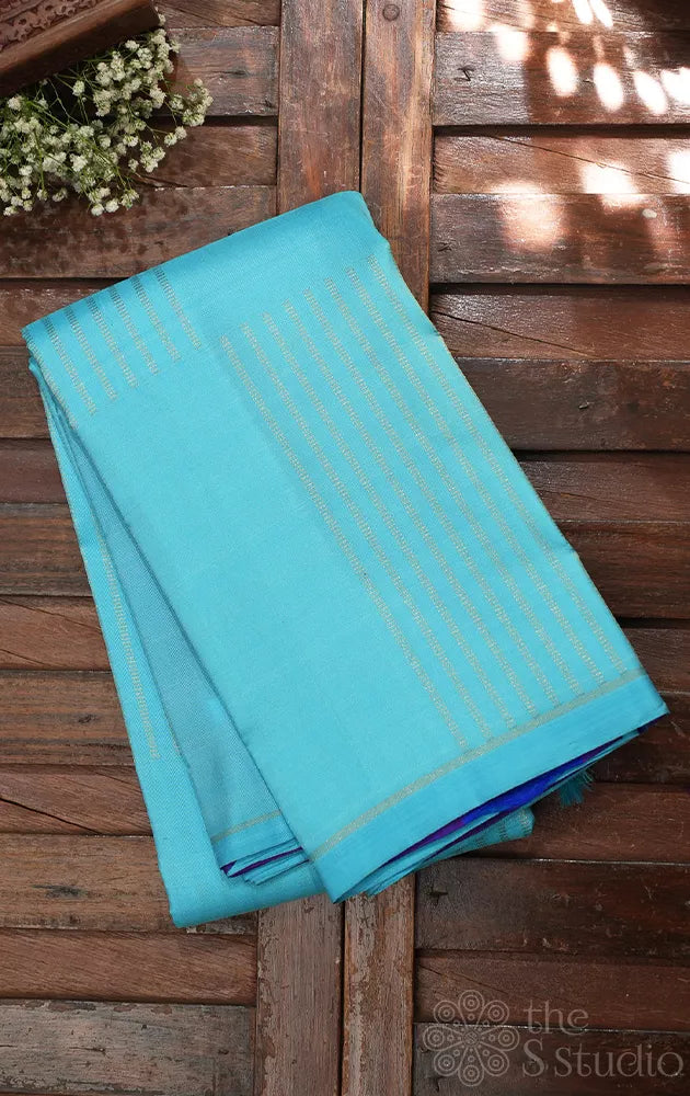 Light blue zari lines kanchi silk saree with purple pallu