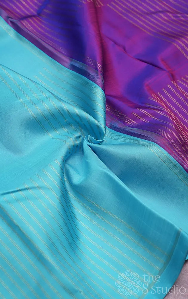 Light blue zari lines kanchi silk saree with purple pallu