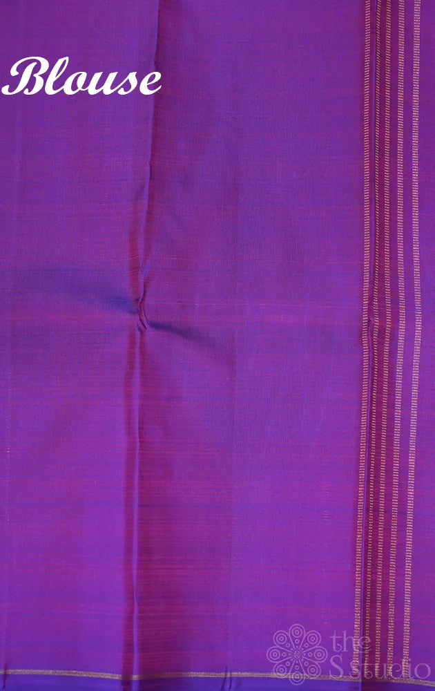 Light blue zari lines kanchi silk saree with purple pallu