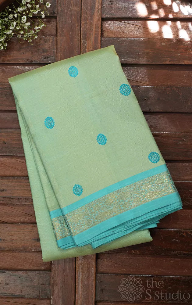 Light pista green small border kanchi silk saree with thread buttas