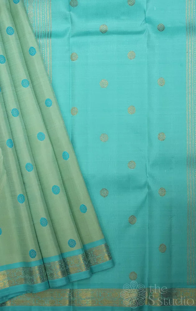 Light pista green small border kanchi silk saree with thread buttas