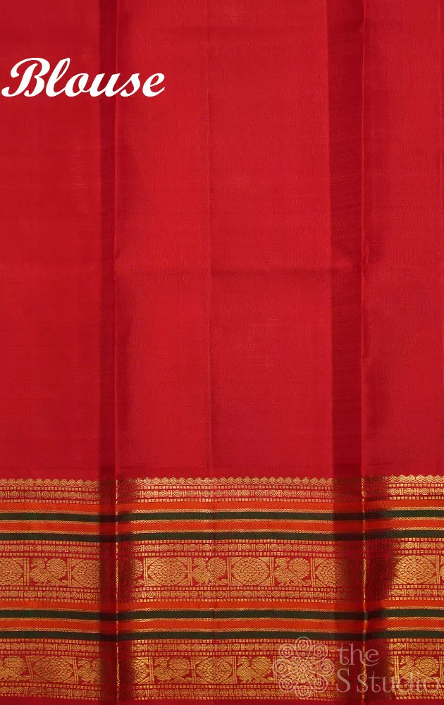 Light peach kanchi silk saree with ganda berunda motifs and korvai red borde