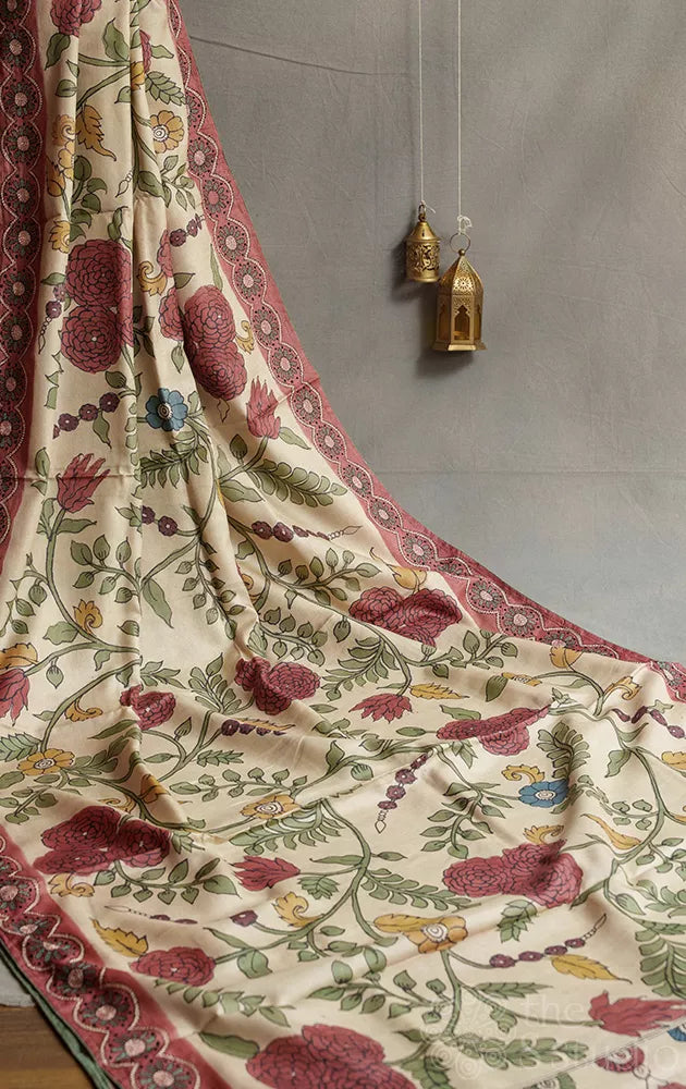 Beige colour tussar kalamkari saree with hand embroidery border