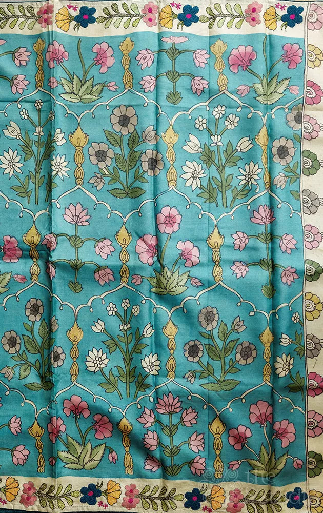 Blue tussar kalamkari saree with off white hand embroidery border