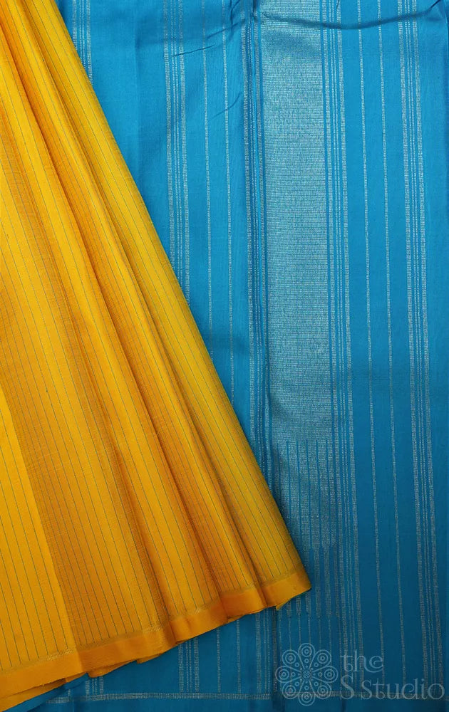 Mango yellow Kanchipuram silk saree with contrast blue pallu