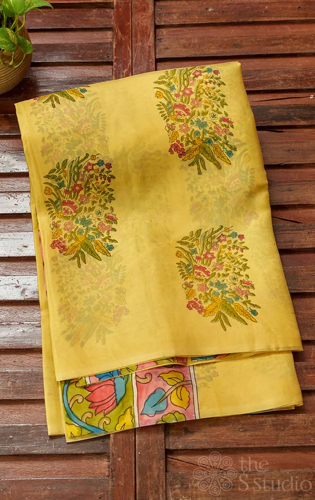 Light Yellow organza saree with floral block print and hand painted Kalamkari pallu