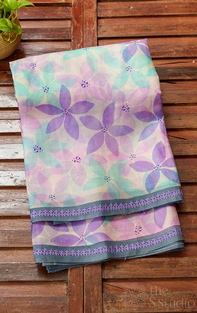 Pink, aqua blue and lavender floral block printed organza saree with hand kutch embriodery