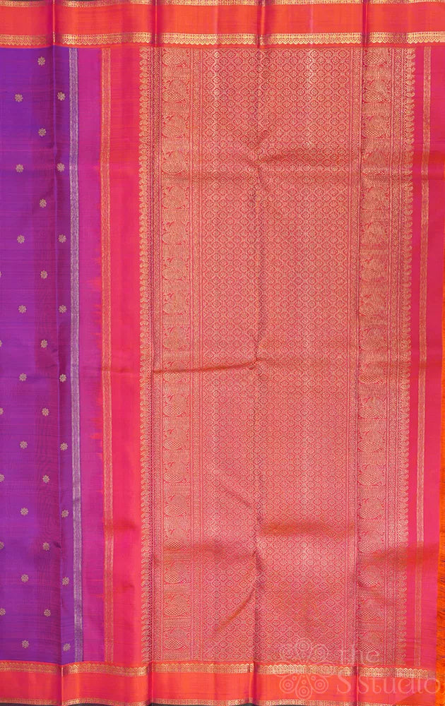Purple kanjivaram silk saree with buttas and peach border