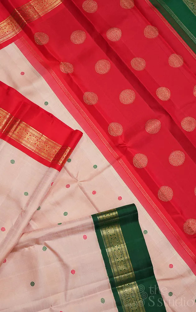 Light peach korvai kanjivaram silk saree with red and green korvai border