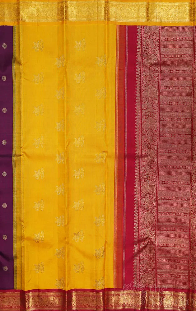 Deep purple korvai kanchipuram silk saree with yellow and red ganga jamuna border