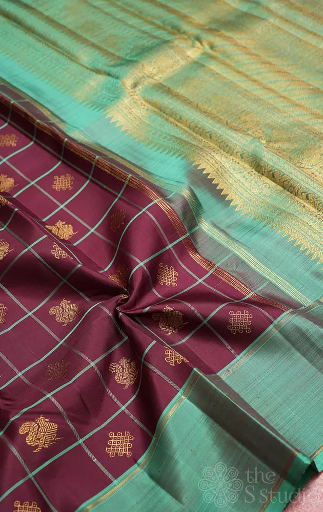 Brown zari checked kanchipuram silk saree with teal green border