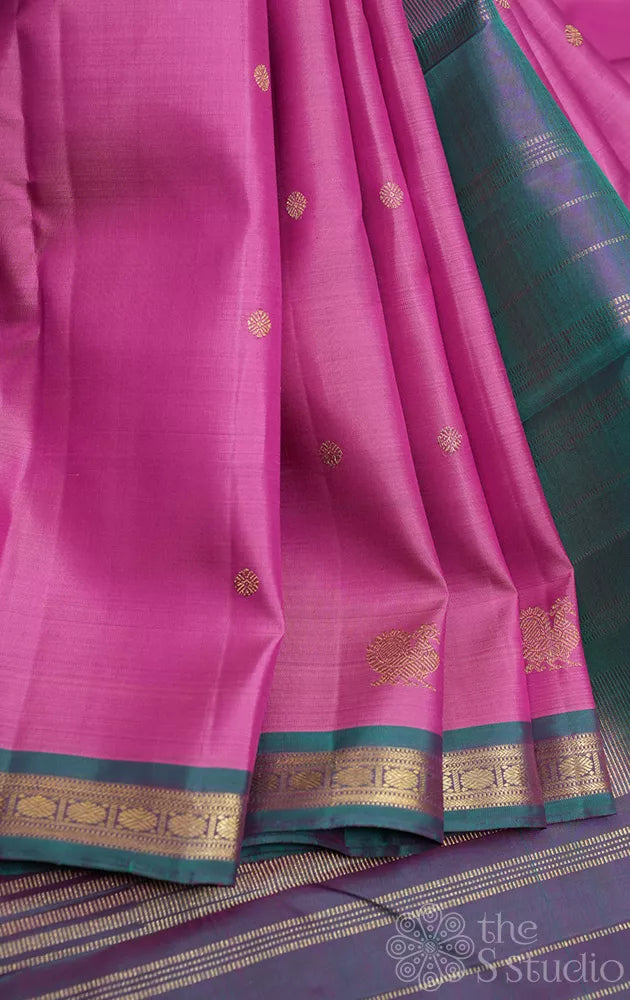 Lotus pink kanjivaram silk saree with small peacock blue border