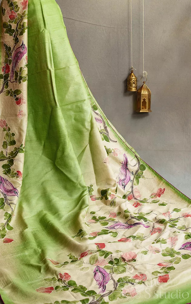 Light green and off white tussar silk saree with hand batik prints