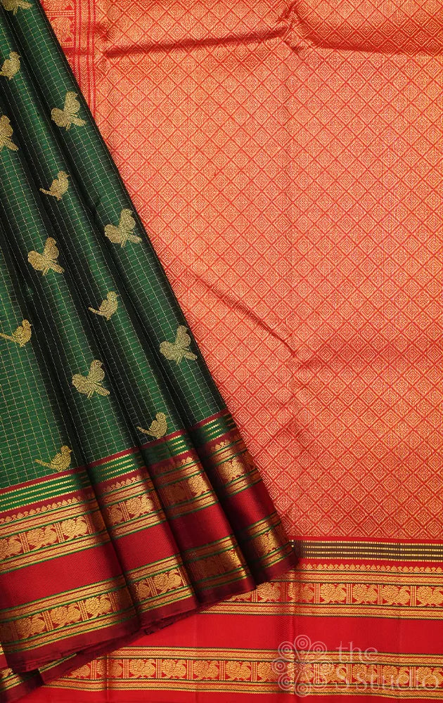 Royal green zari checked kanchipuram silk saree with red rettaipet border