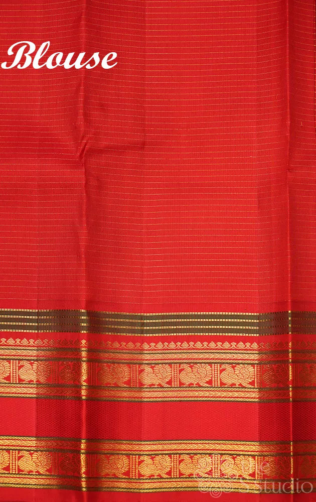 Royal green zari checked kanchipuram silk saree with red rettaipet border