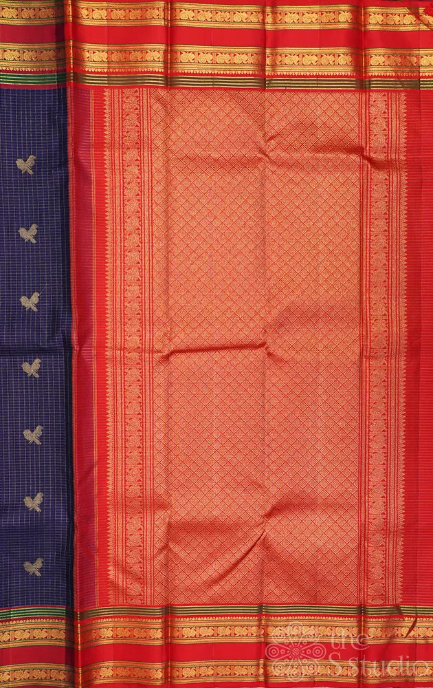 Navy blue checked kanjivaram silk saree with red rettaipet border