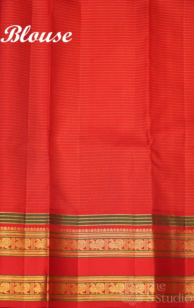 Navy blue checked kanjivaram silk saree with red rettaipet border