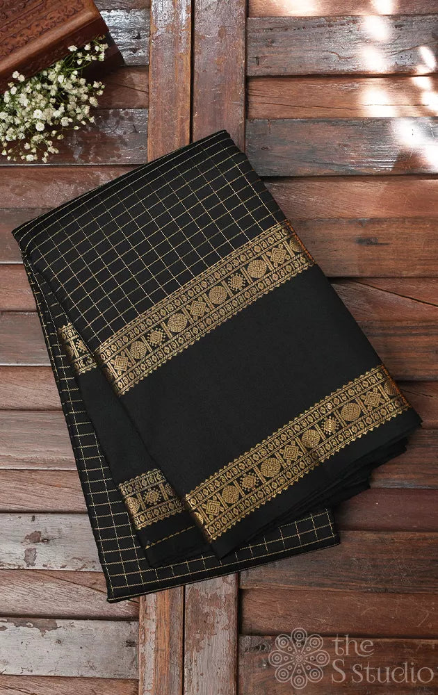 Black kanchipuram silk saree with zari checks and rettaipet border