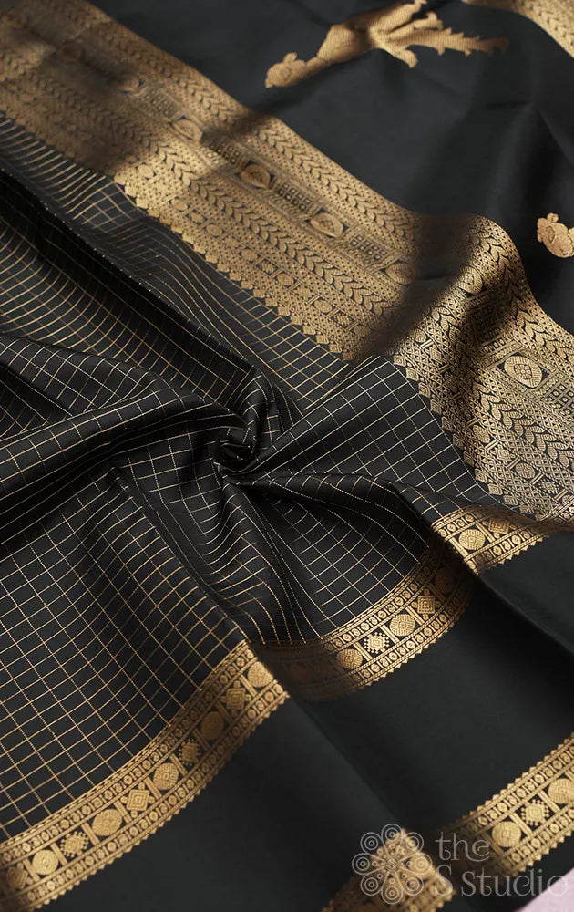 Black kanchipuram silk saree with zari checks and rettaipet border