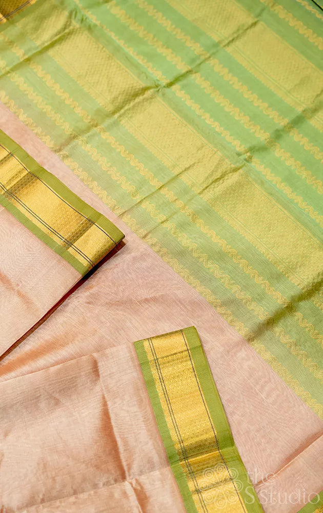 Beige silk cotton saree with green zari border
