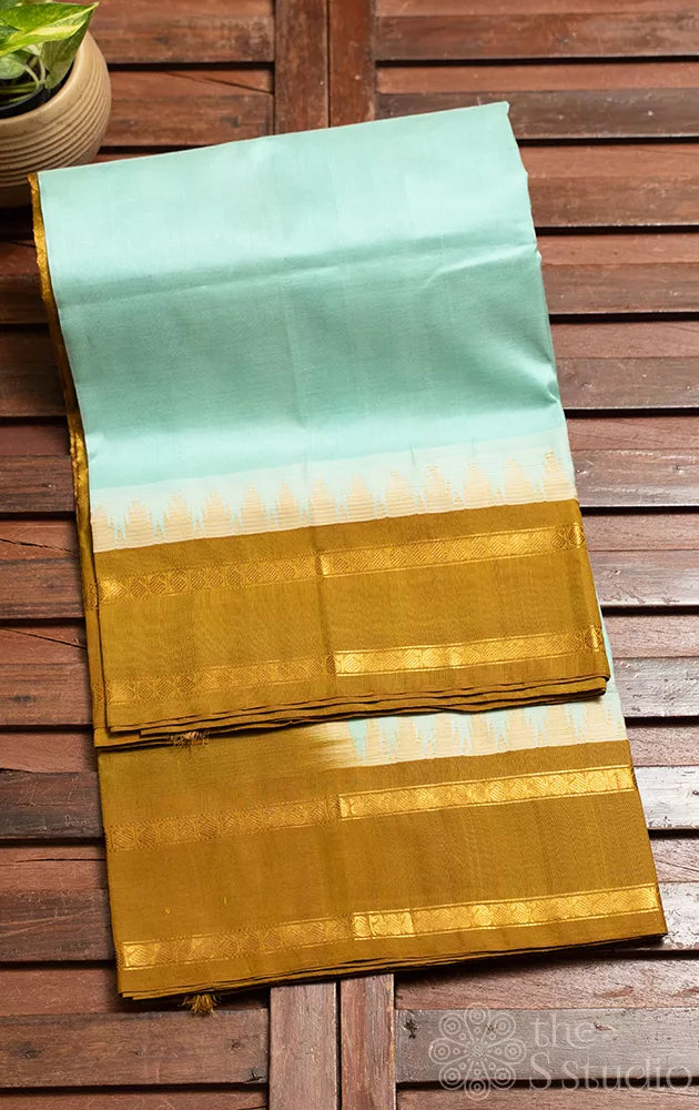 Aqua blue silk cotton saree with rettaipet border