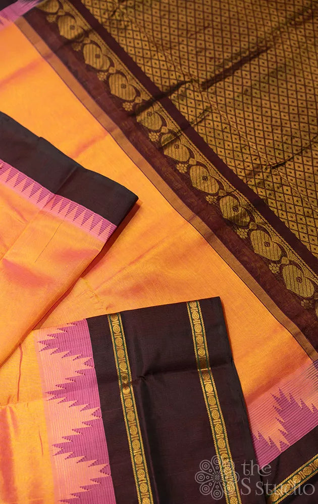 Light peach handloom silk cotton saree with temple border