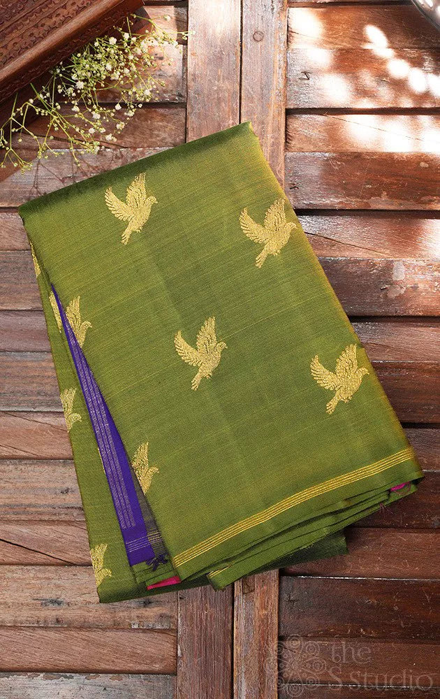 Chutney green kanchipuram silk saree with bird motifs and double pallu