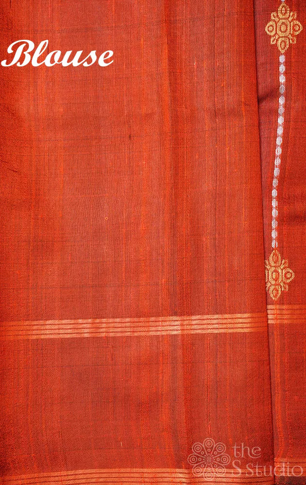 Orange raw silk saree with zari buttas