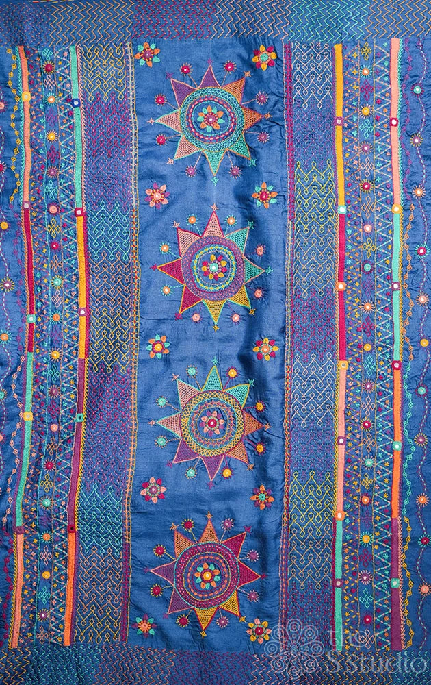 Blue hand tie and dye bandhani tussar silk saree with lambani embroidery