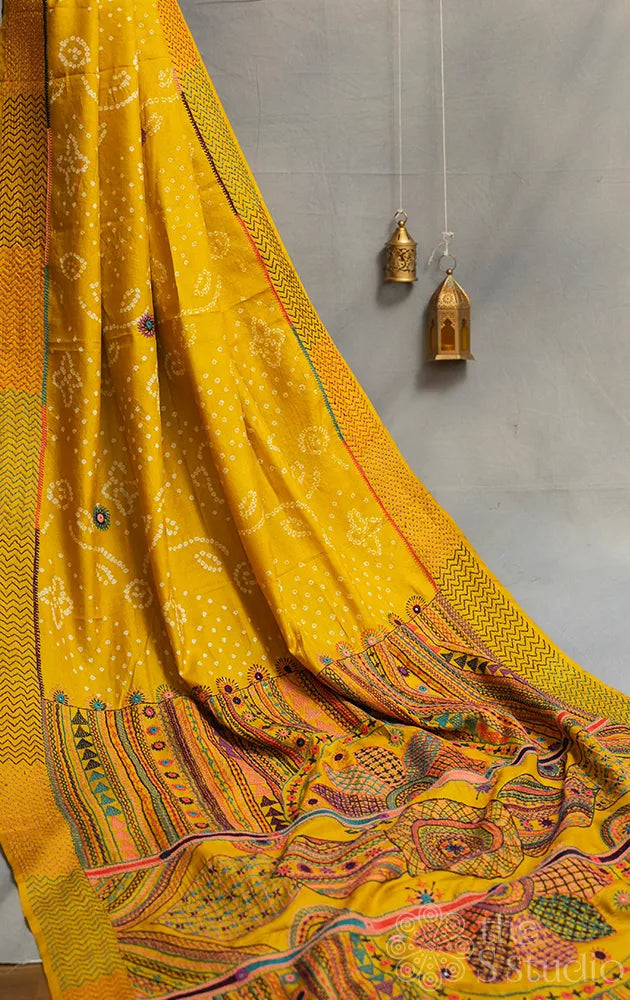Yellow hand tie & dye bandhani tussar silk saree with lambani embroidery
