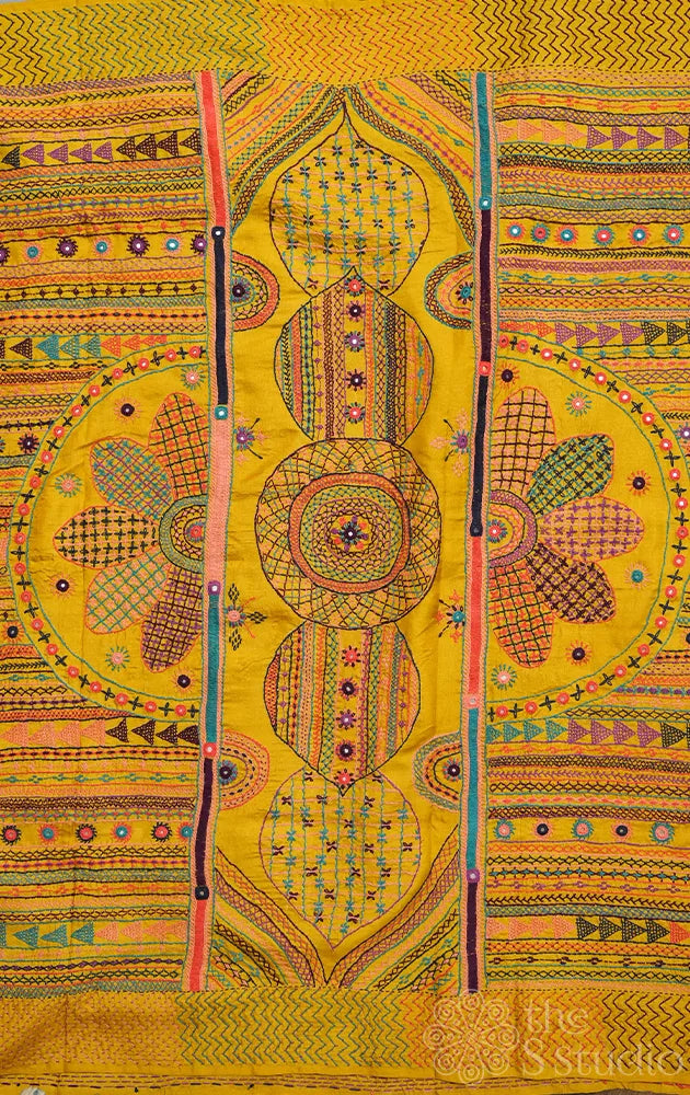 Yellow hand tie & dye bandhani tussar silk saree with lambani embroidery