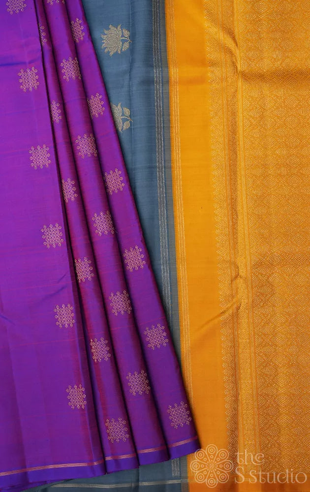 Purple kanchipuram silk saree with kolam buttas and double pallu