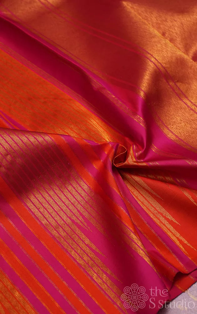 Rani pink and orange kanchi silk saree with thazampoo reku design