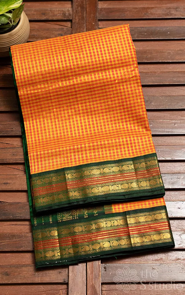 Orange and yellow checked silk cotton saree with korvai border