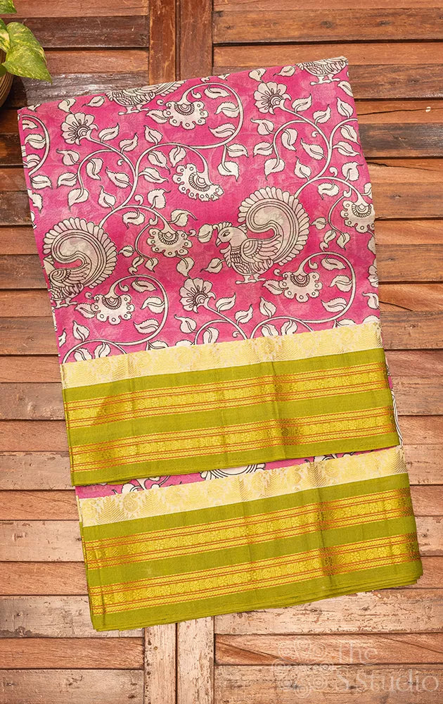 Pink printed silk cotton saree with green korvai border