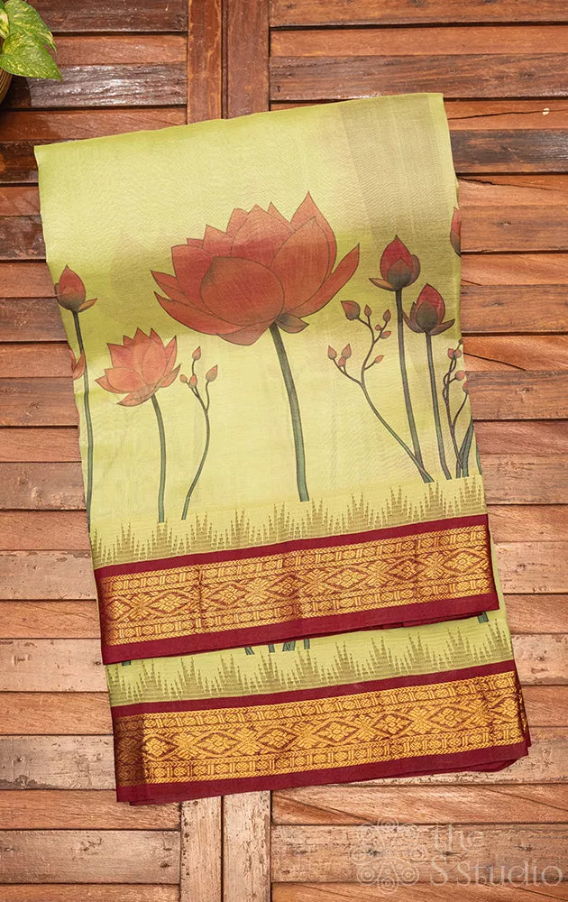 Green lotus printed silk cotton saree with korvai brown border