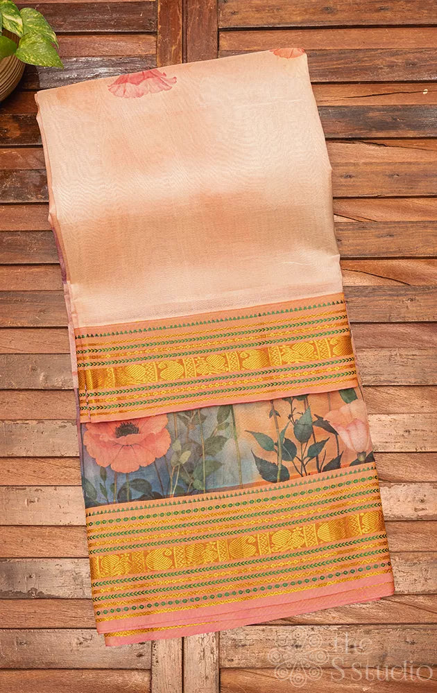 Light peach floral printed silk cotton saree with pink korvai border