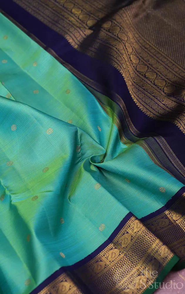 Sea green vairaoosi kanchi silk saree with korvai blue border