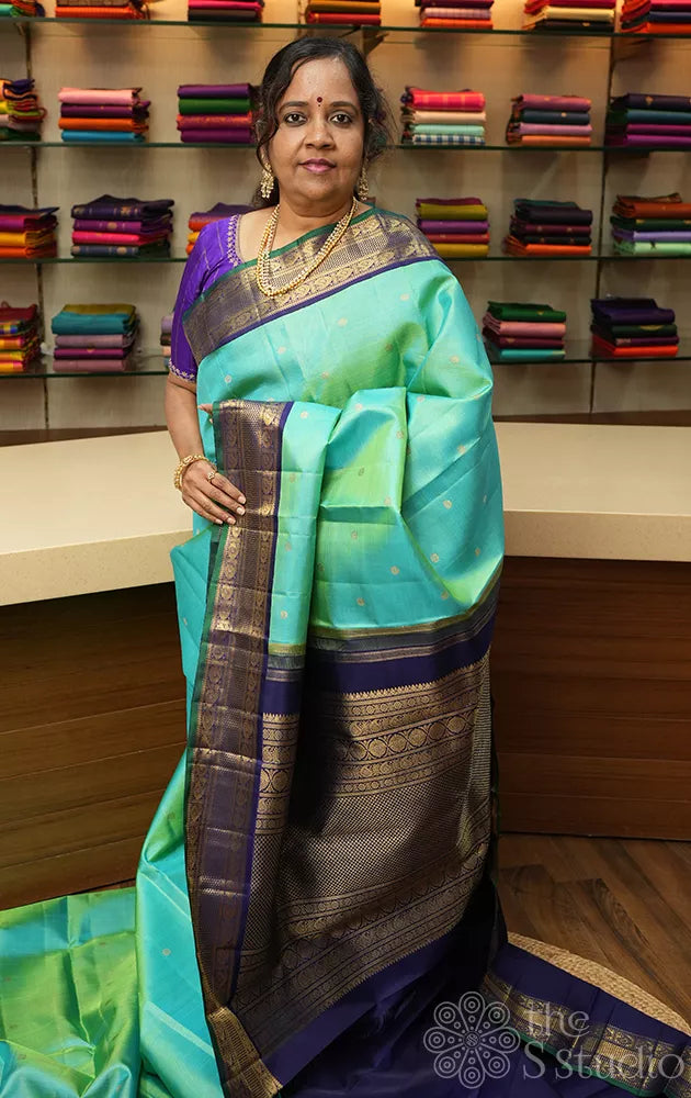 Sea green vairaoosi kanchi silk saree with korvai blue border