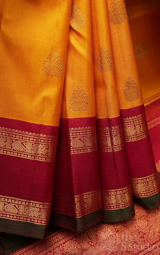 Mustard kanchi pattu saree with korvai maroon border