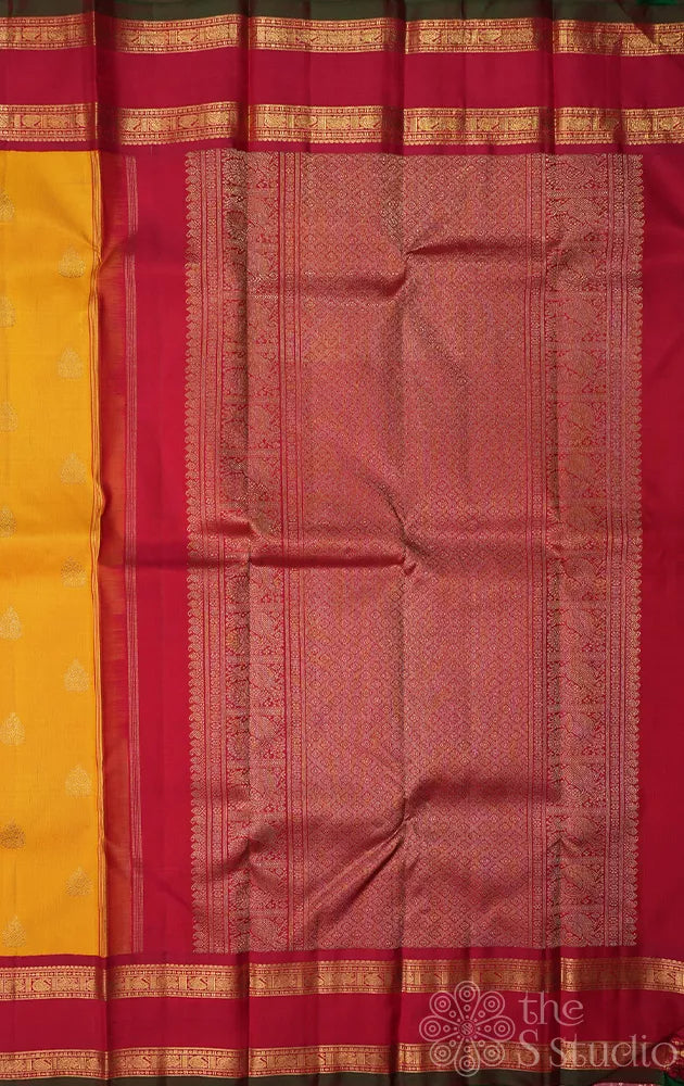 Mustard kanchi pattu saree with korvai maroon border