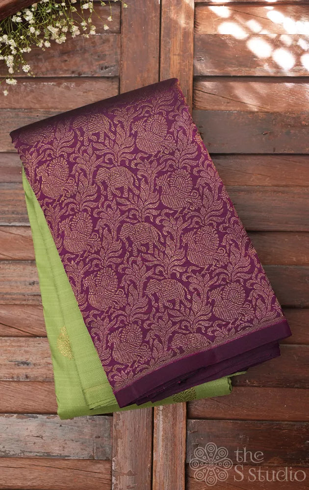 Elachi green kanchi silk saree with korvai purple long border