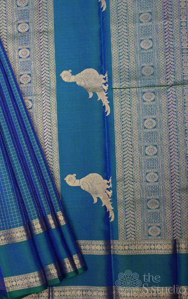 Peacock blue zari checked kanchi pattu saree with rettaipet zari border