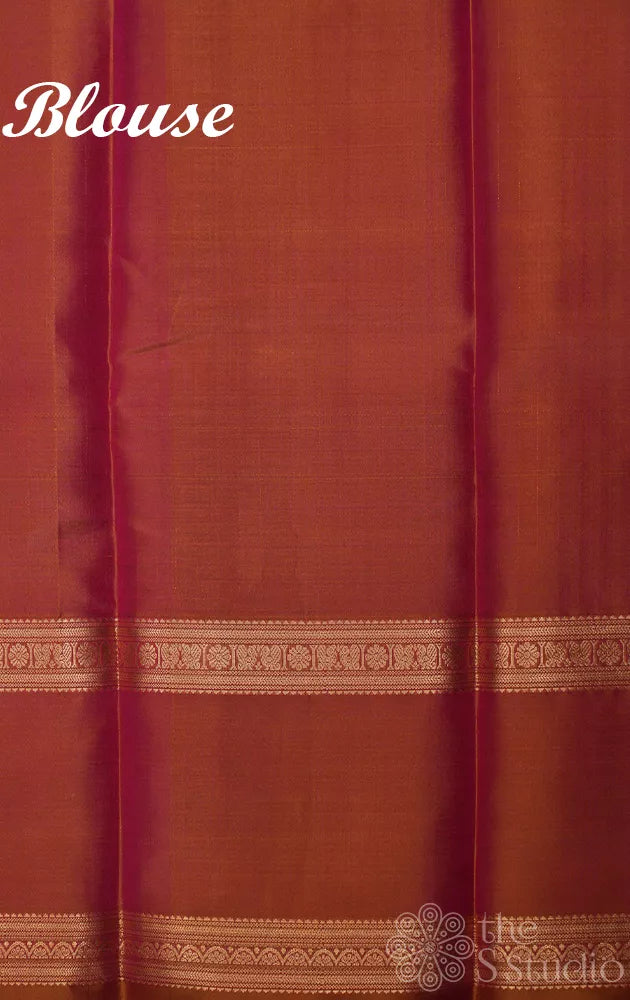 Peachish mustard kanjivaram silk saree with zari checks and rettaipet border