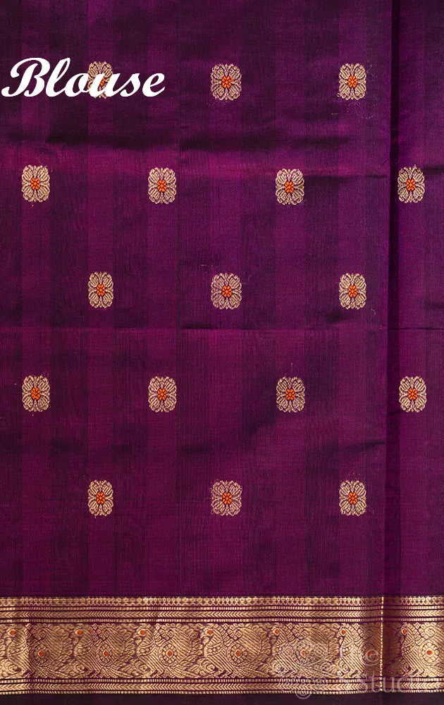 Purple silk cotton saree with small zari border
