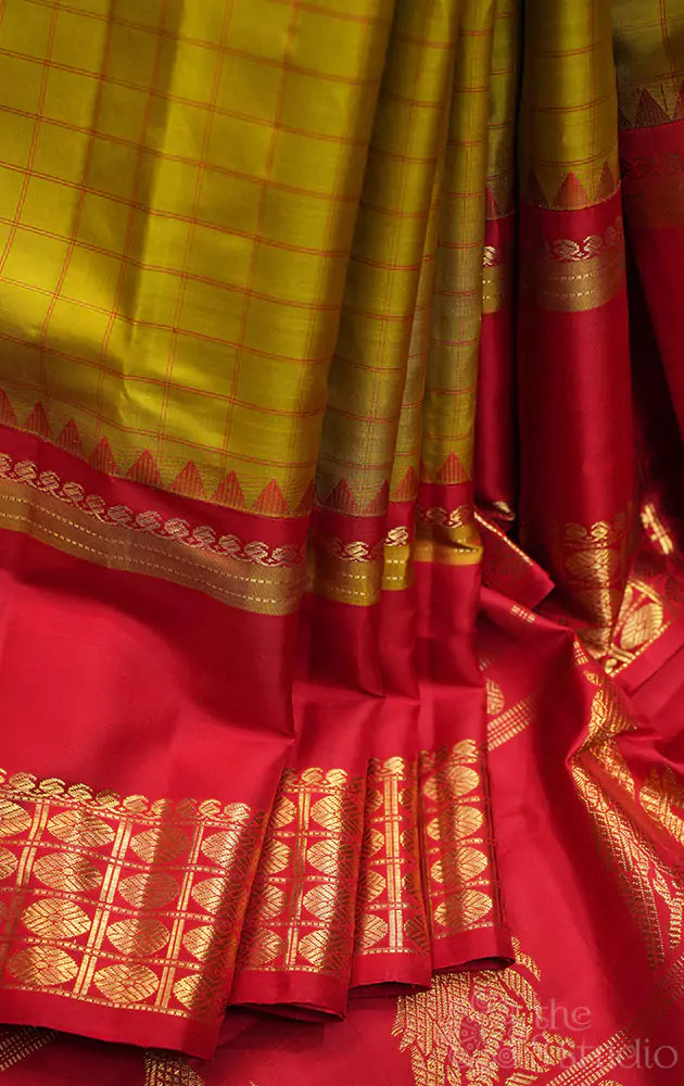 Green checked adai kanjivaram silk saree with red border