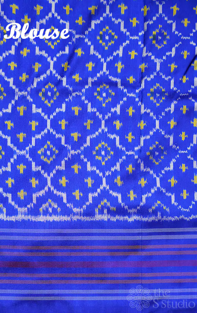 Peach twill ikkat silk saree with blue border